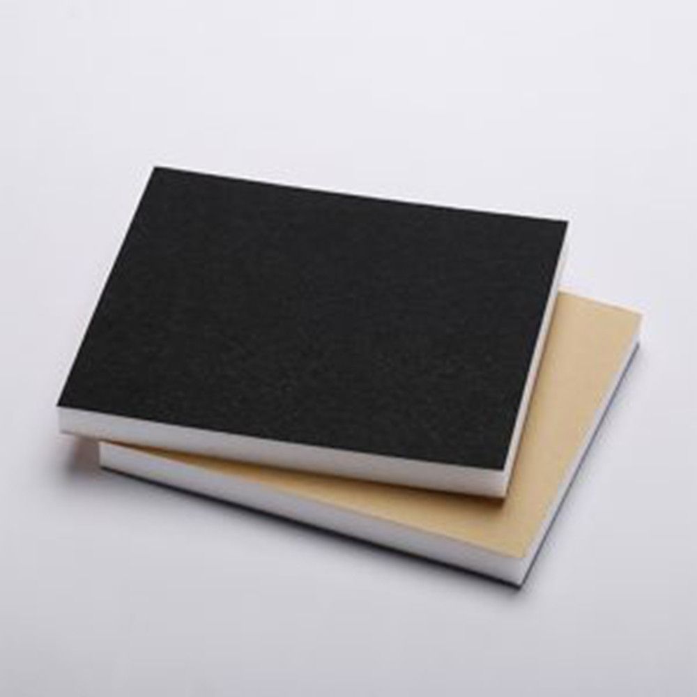 Planchas de espuma técnica con velo textil negro y beige